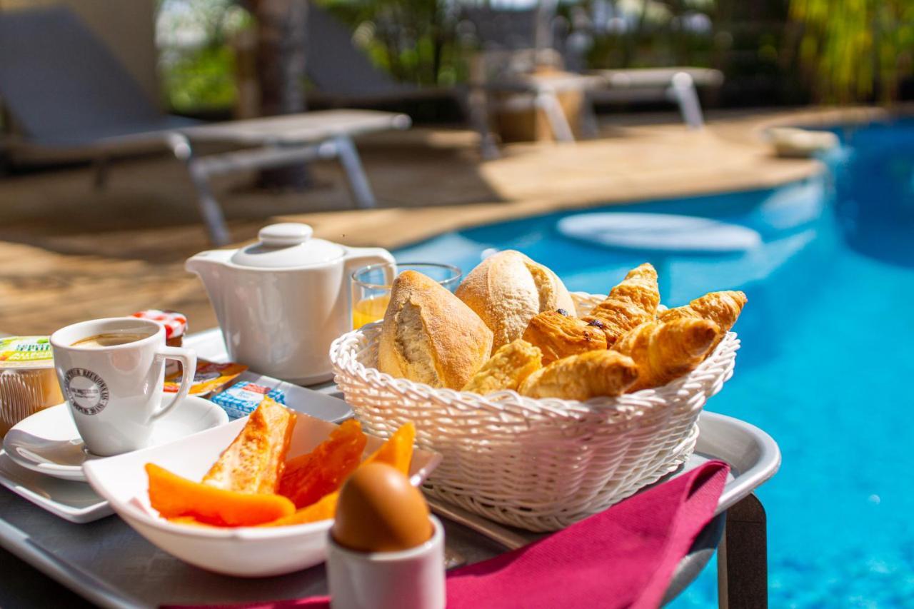 Le Kerveguen Hotel Saint-Gilles-les Bains Eksteriør billede
